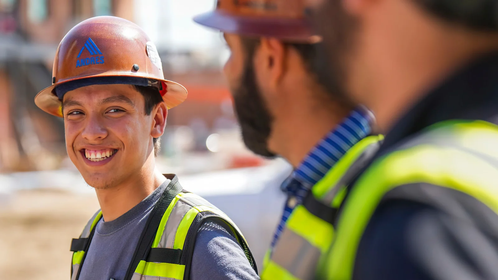 ANDRES field operators in conversation on a construction site